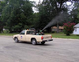 Truck Spraying Mosquito Spray